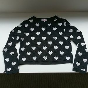 Girls black sweater with white hearts